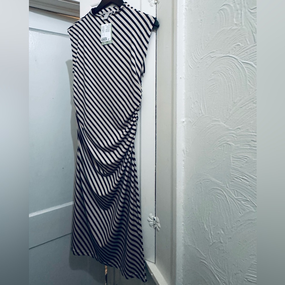 H&M Midi black and white striped satiny ruched sleeveless dress.